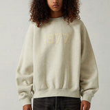 Interior view of Fear of God Essentials Sweatshirt with organised compartments