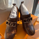 Back view of Louis Vuitton luxury piece style No.012