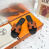 Hermès Tan Crisscross Strap Sandals - Lifestyle Styling Shot