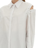 Close-up of Alexander McQueen tee shirts hardware and fine stitching