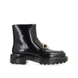 Close-up of Bottega Veneta boots & booties hardware and fine stitching