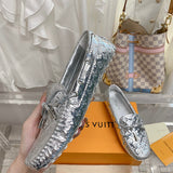 Louis Vuitton White Low-Top Sneakers - Close-Up Texture View
