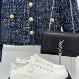 Texture and finish detail of Saint Laurent luxury piece style No.024