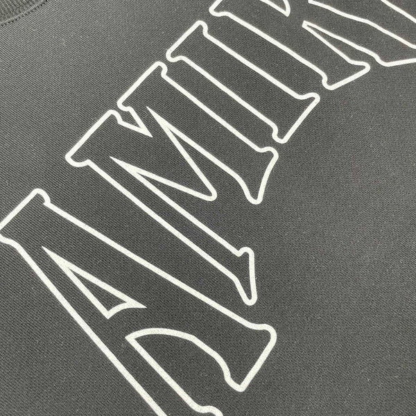 Three-quarter angle view of Amiri luxury piece style No.086