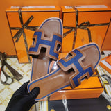 Hermès Beige Slide Sandals - Angled View