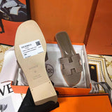 Hermès Grey Crisscross Strap Sandals - Lifestyle Styling Shot