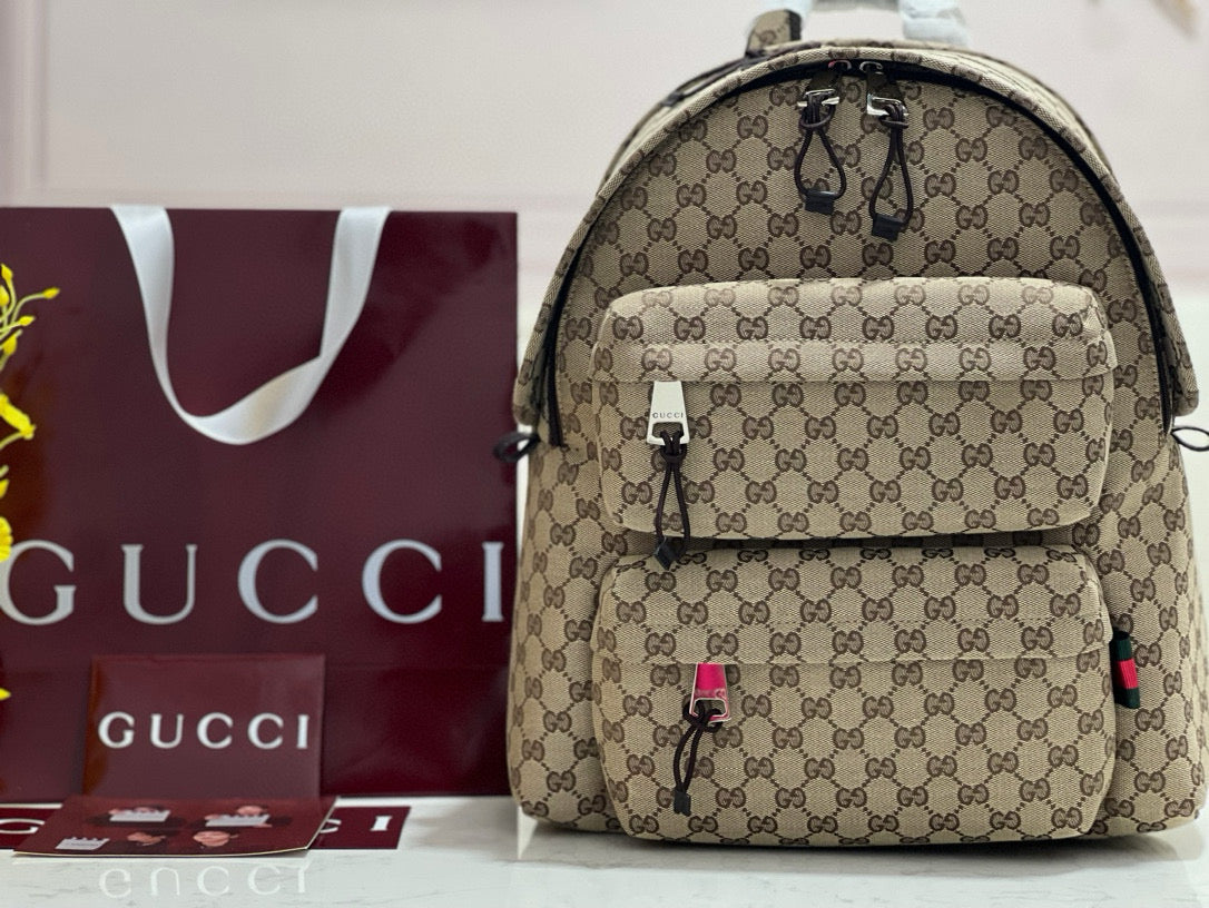 Gucci Backpack – luxury designer piece with signature house detailing