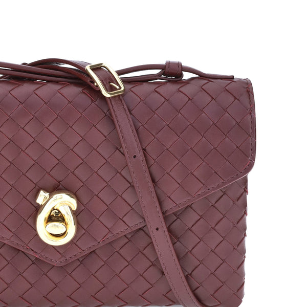 Close-up of Bottega Veneta shoulder bags hardware and fine stitching