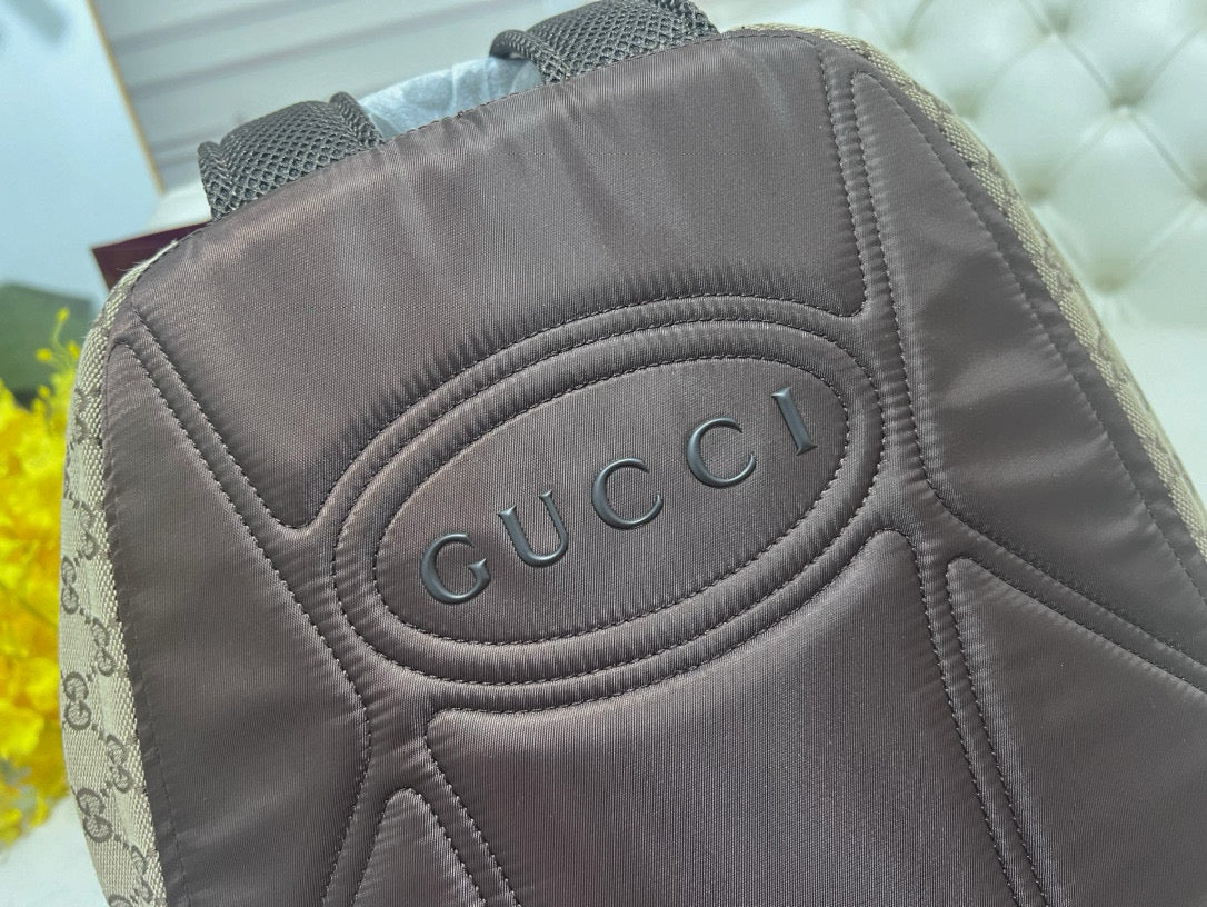 Interior view of Gucci Backpack with organised compartments