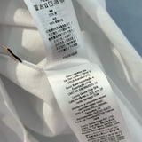 Gucci T-Shirt flat lay on neutral background