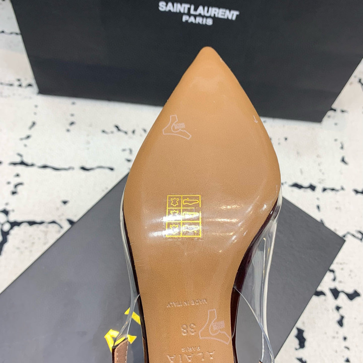 Front view of Alaïa Flats premium footwear
