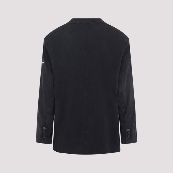 Close-up of Balenciaga jacket hardware and fine stitching