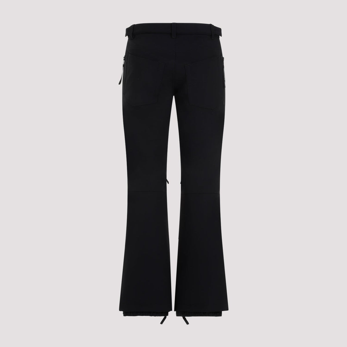 Close-up of Balenciaga trousers hardware and fine stitching