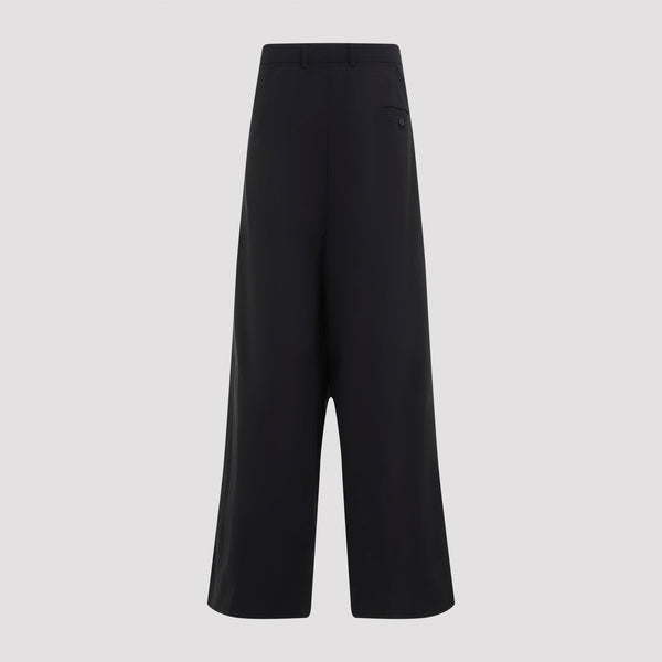 Close-up of Balenciaga trousers hardware and fine stitching