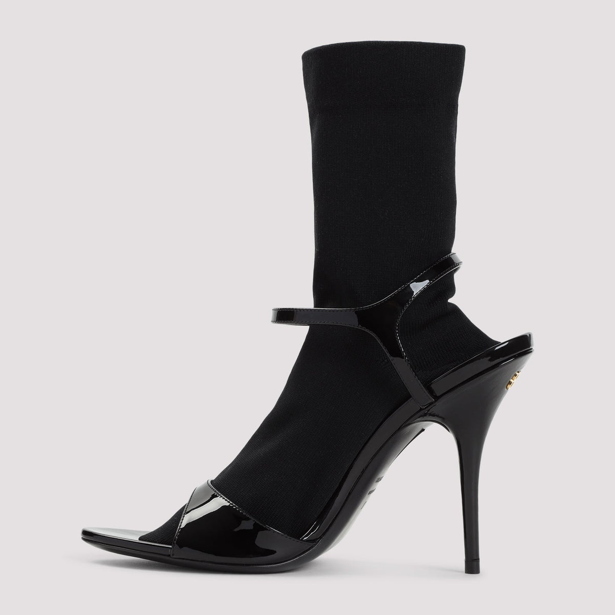 Close-up of Balenciaga ankle boots hardware and fine stitching