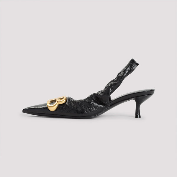 Close-up of Balenciaga pumps hardware and fine stitching