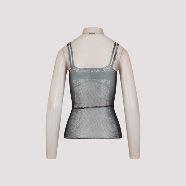 Close-up of Balenciaga topwear hardware and fine stitching