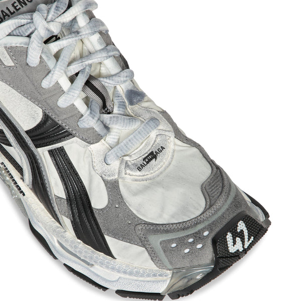 Close-up of Balenciaga sneakers hardware and fine stitching