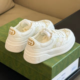 Gucci Embossed Sneaker – luxury designer sneakers at Velouxe