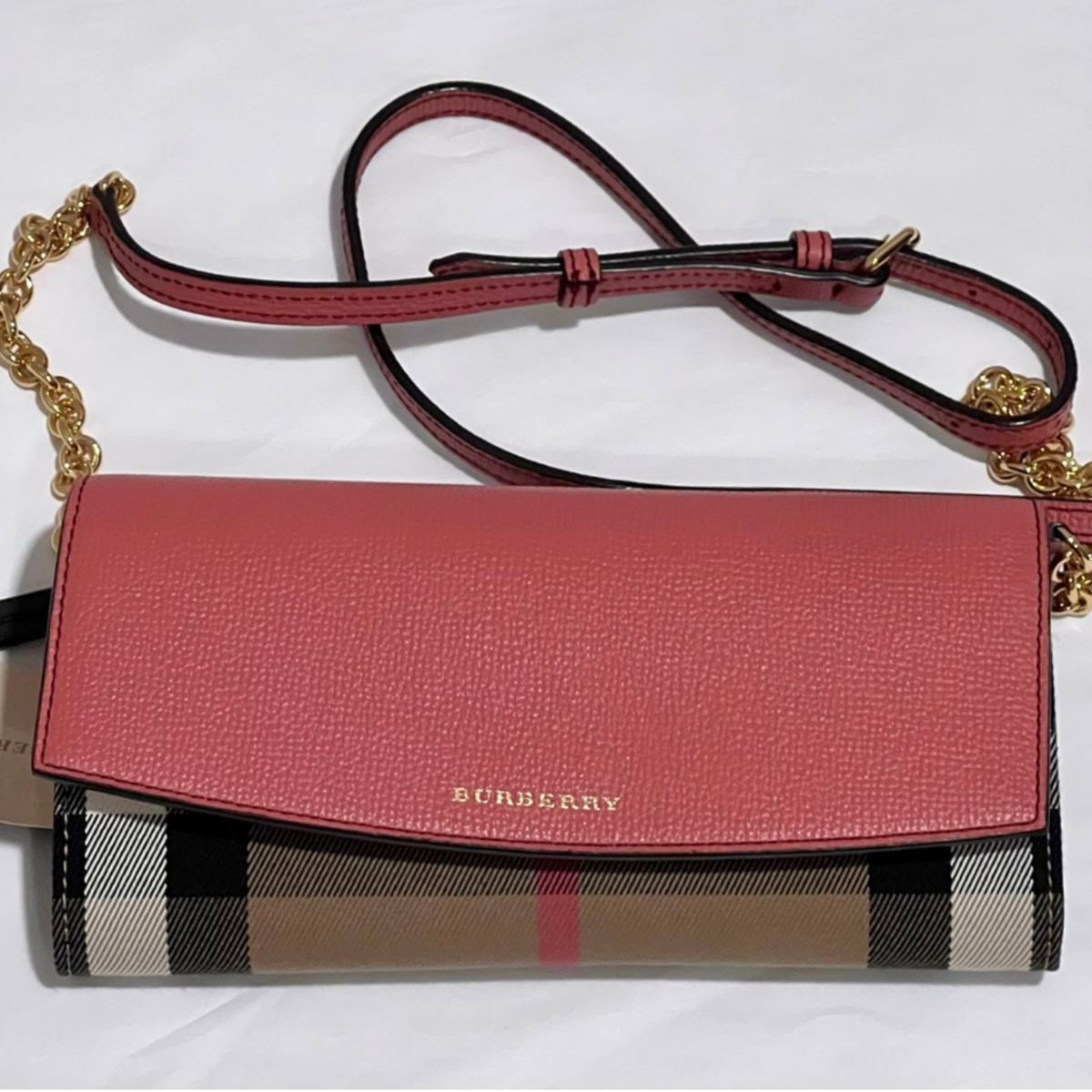 Close-up of Burberry crossbody bags hardware and fine stitching