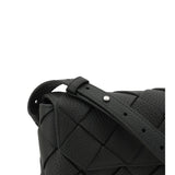 Close-up of Bottega Veneta cross body bags hardware and fine stitching