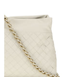 Close-up of Bottega Veneta clutches hardware and fine stitching
