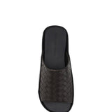 Close-up of Bottega Veneta sandals hardware and fine stitching
