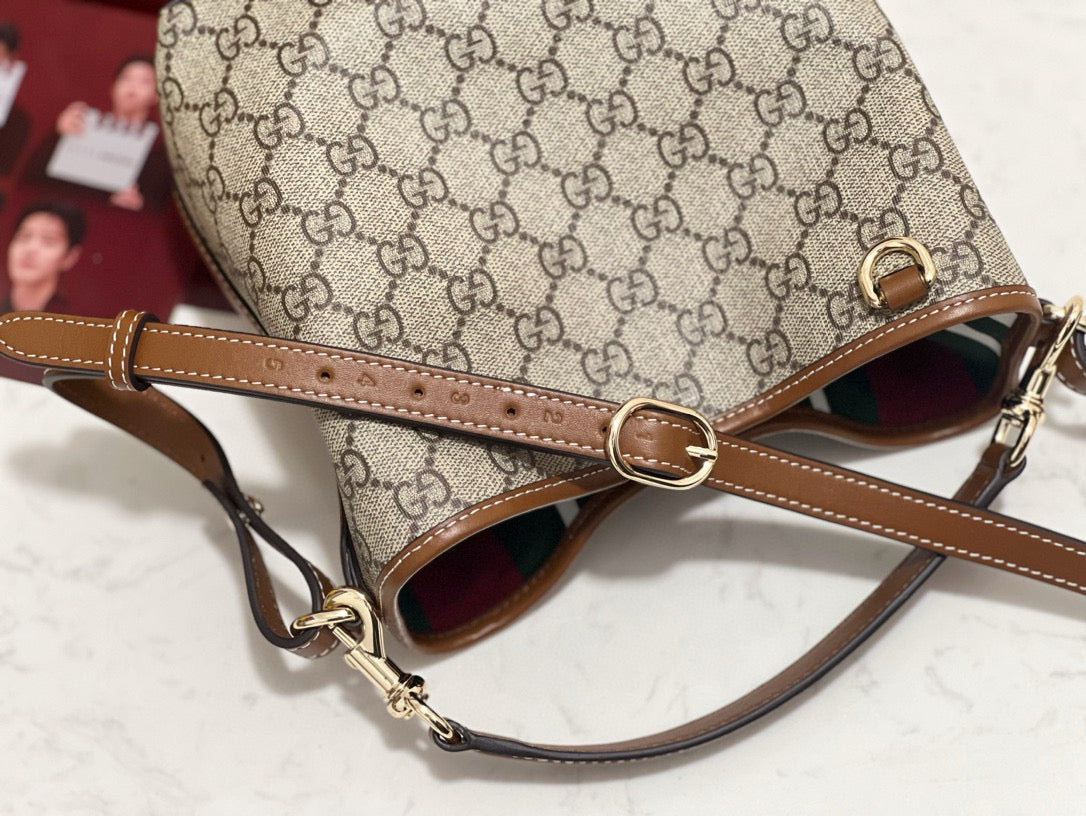 Gucci Emblem Mini Bucket Bag – luxury designer bucket bag at Velouxe