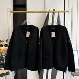 Balenciaga Cardigan – luxury designer piece at Velouxe