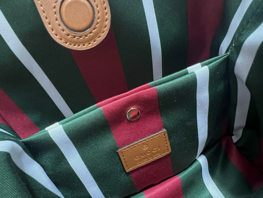 Gucci Emblem Mini Bucket Bag detail shot – designer craftsmanship and quality