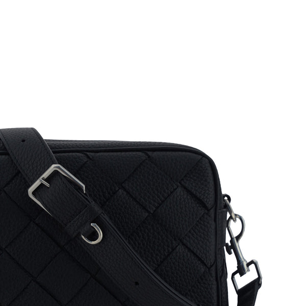 Close-up of Bottega Veneta cross body bags hardware and fine stitching