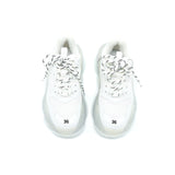 Side view of Balenciaga shoe White premium designer bag