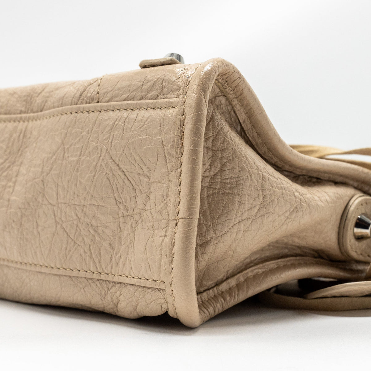 Side view of Balenciaga handbag Beige premium designer bag