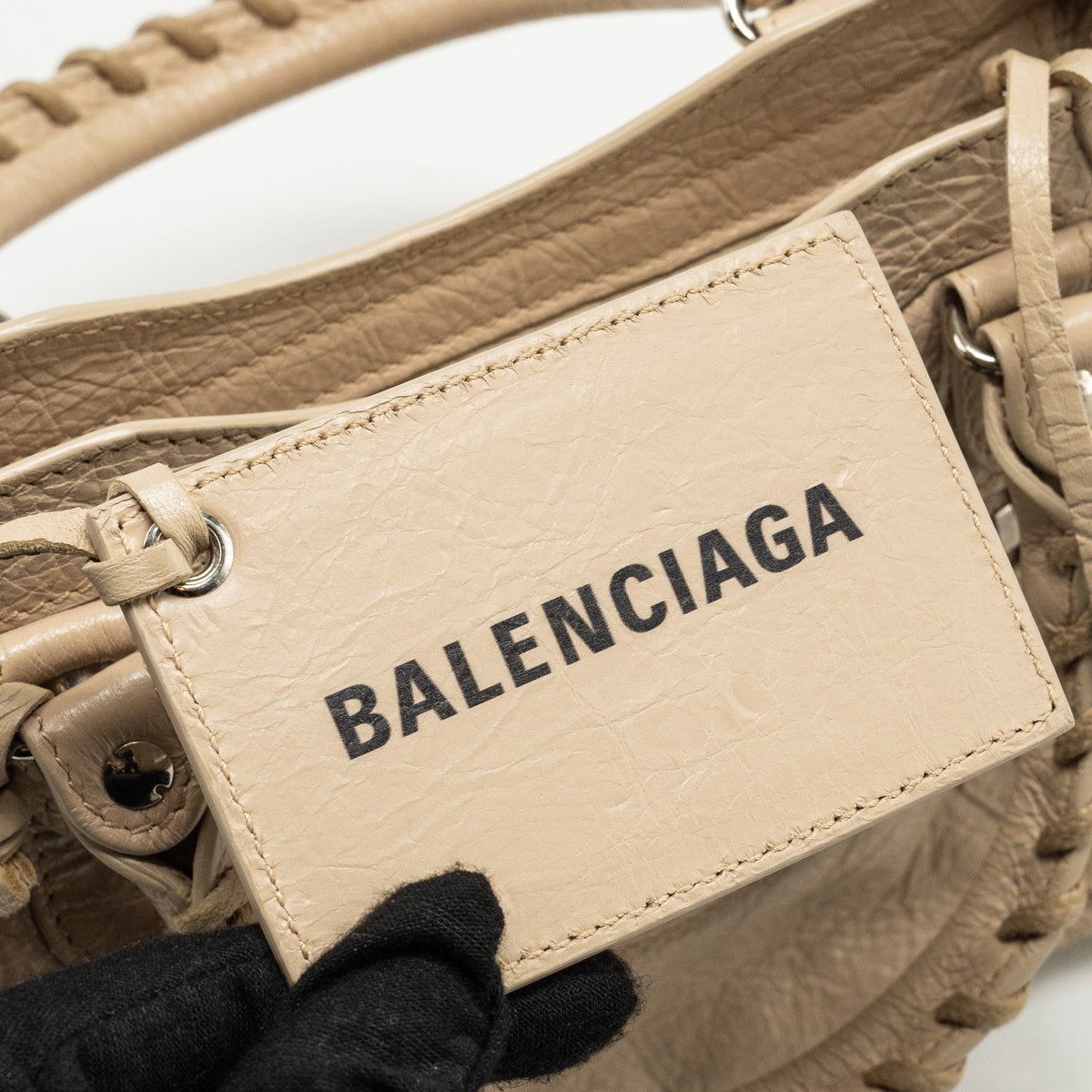 Side view of Balenciaga handbag Beige premium designer bag