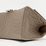 Side view of Balenciaga handbag Beige premium designer bag