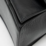Side view of Balenciaga handbag Black premium designer bag