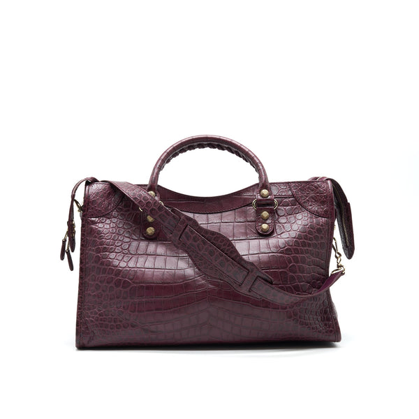 Side view of Balenciaga handbag Burgundy premium designer bag