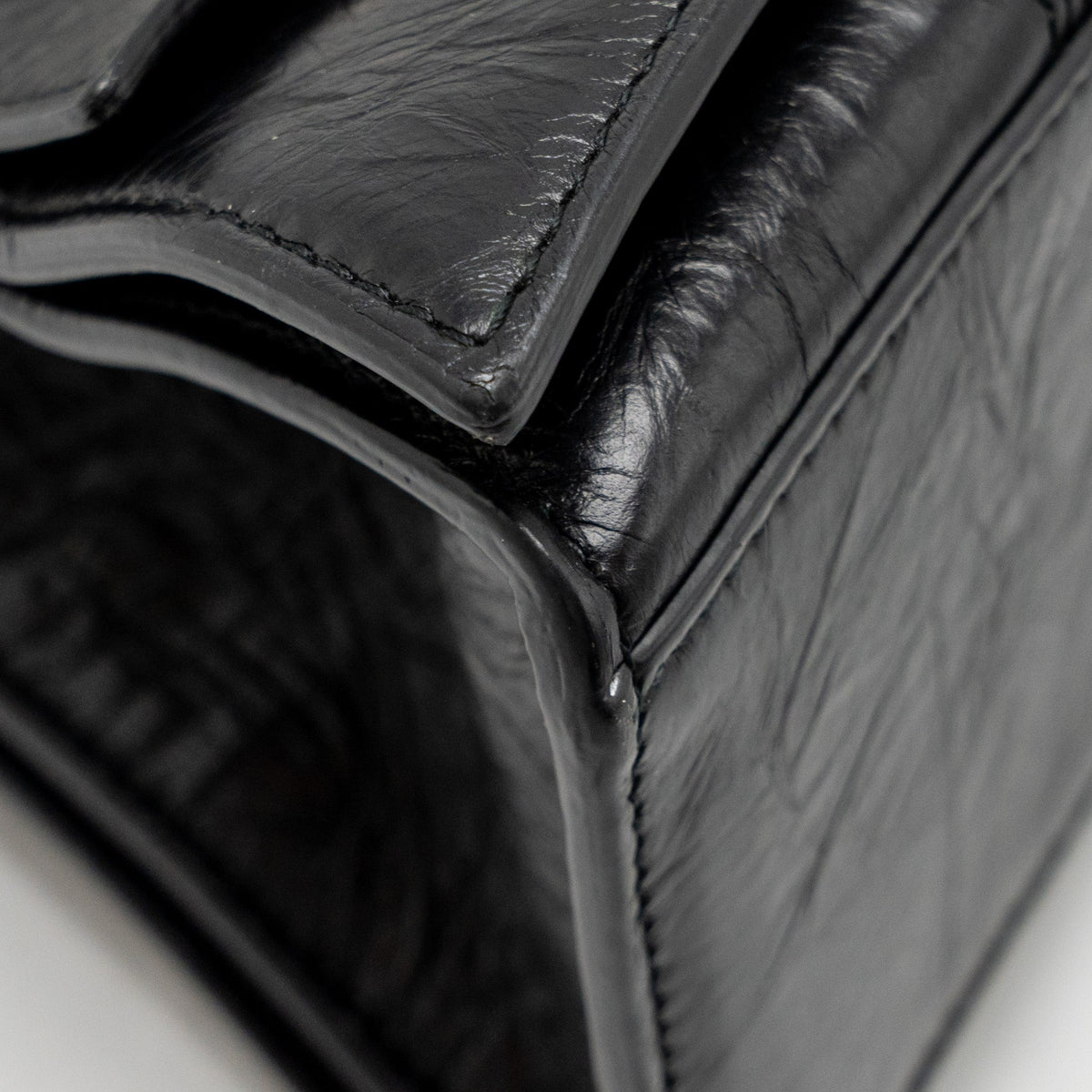 Side view of Balenciaga handbag Black premium designer bag