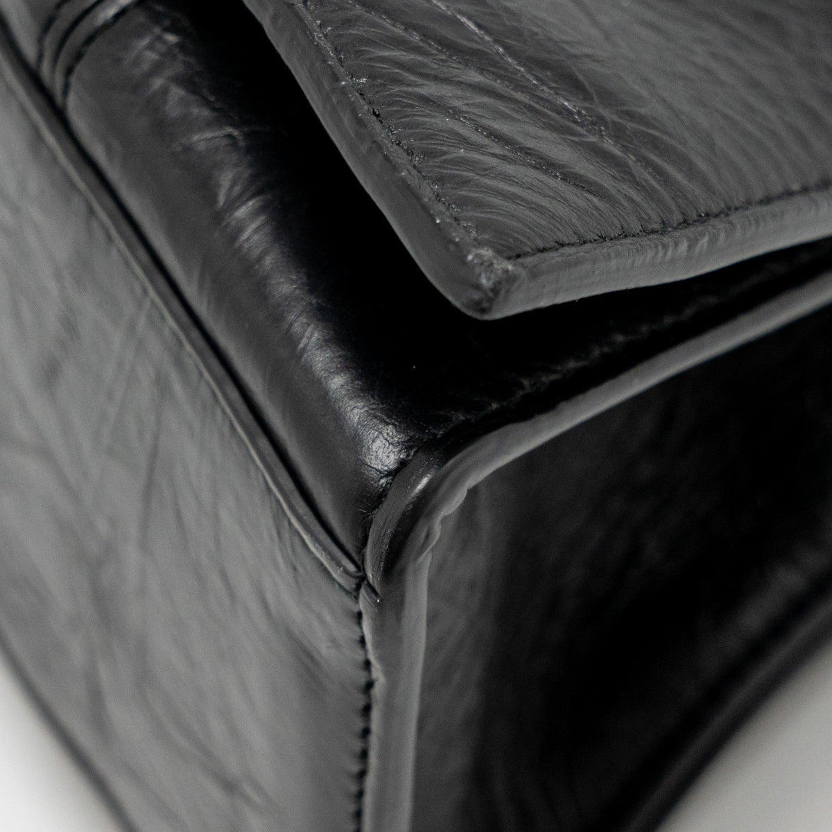 Side view of Balenciaga handbag Black premium designer bag