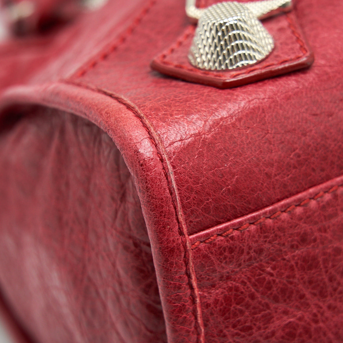 Side view of Balenciaga handbag Red premium designer bag