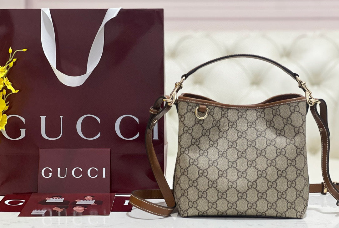 Gucci Emblem Mini Bucket Bag – luxury designer bucket bag at Velouxe