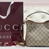 Gucci Emblem Mini Bucket Bag – luxury designer bucket bag at Velouxe