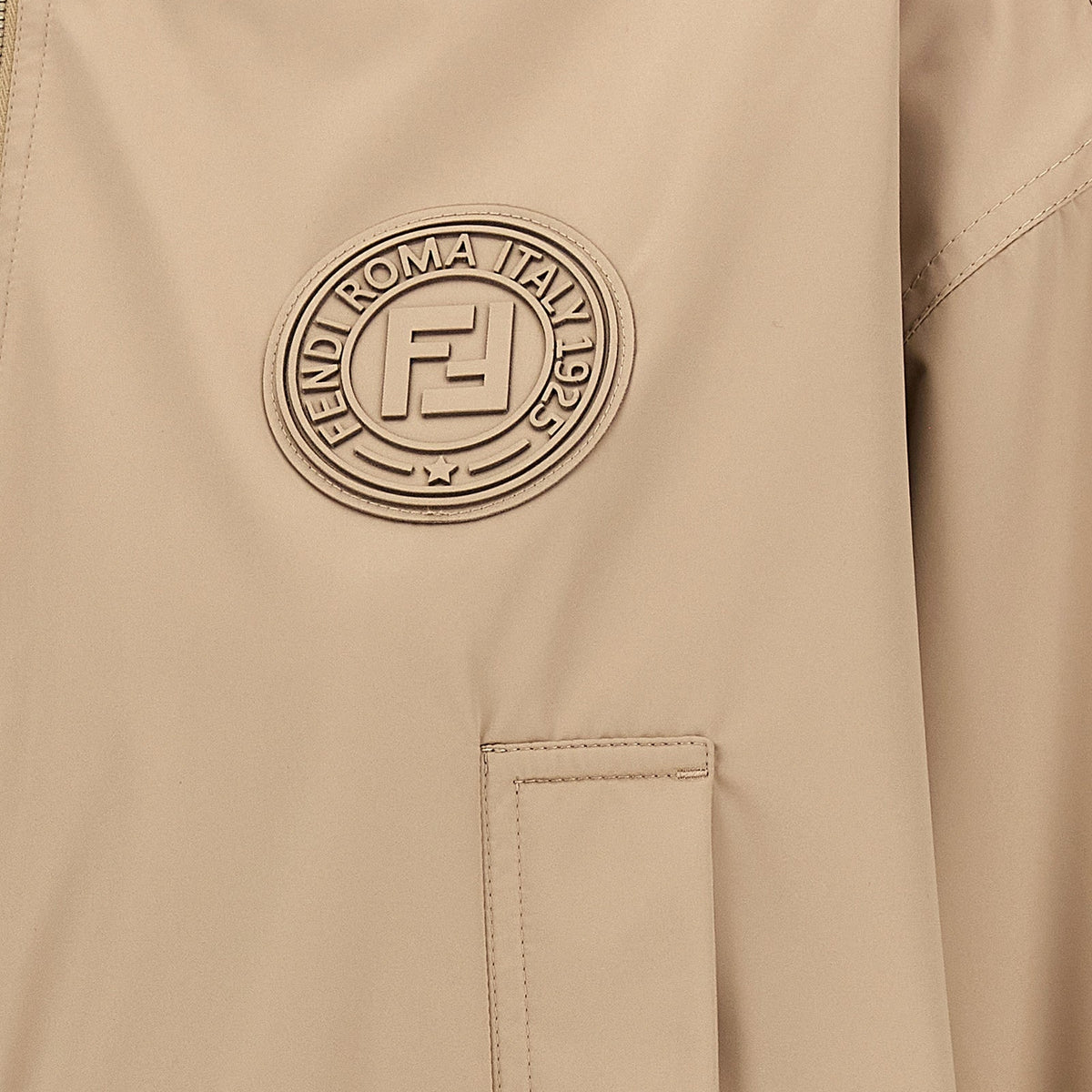 Close-up of Fendi coats hardware and fine stitching