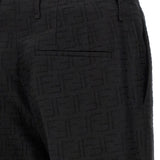 Close-up of Fendi pants hardware and fine stitching