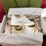 Gucci Sneakers – luxury designer piece with signature house detailing