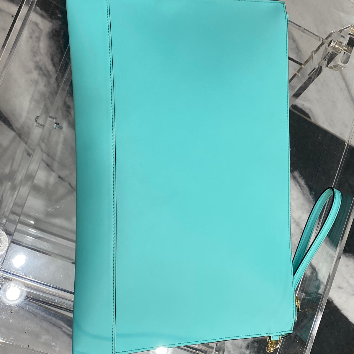 Fendi wristlet clutch lifestyle shot premium designer piece