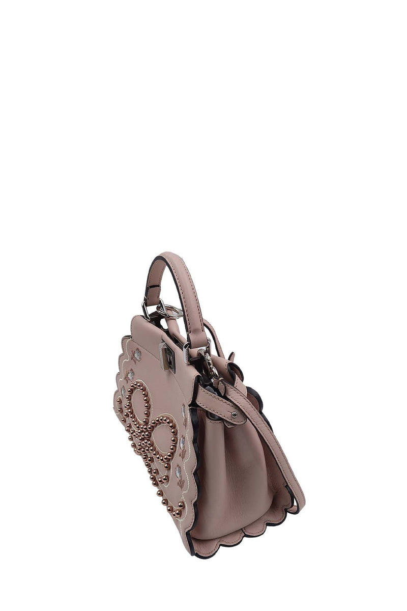 Close-up of Mini bags hardware and fine stitching