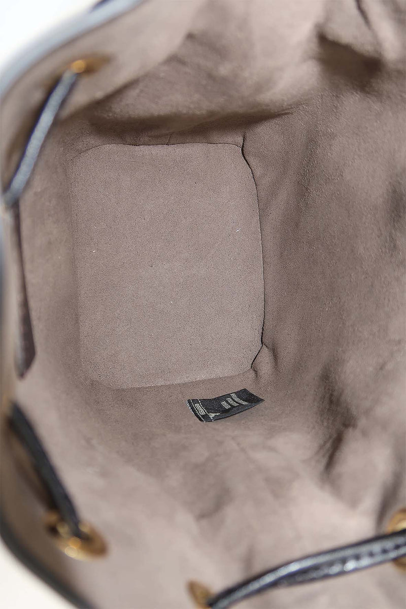 Close-up of Mini bags hardware and fine stitching