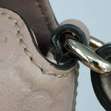 Close-up of Gucci bags hardware and fine stitching