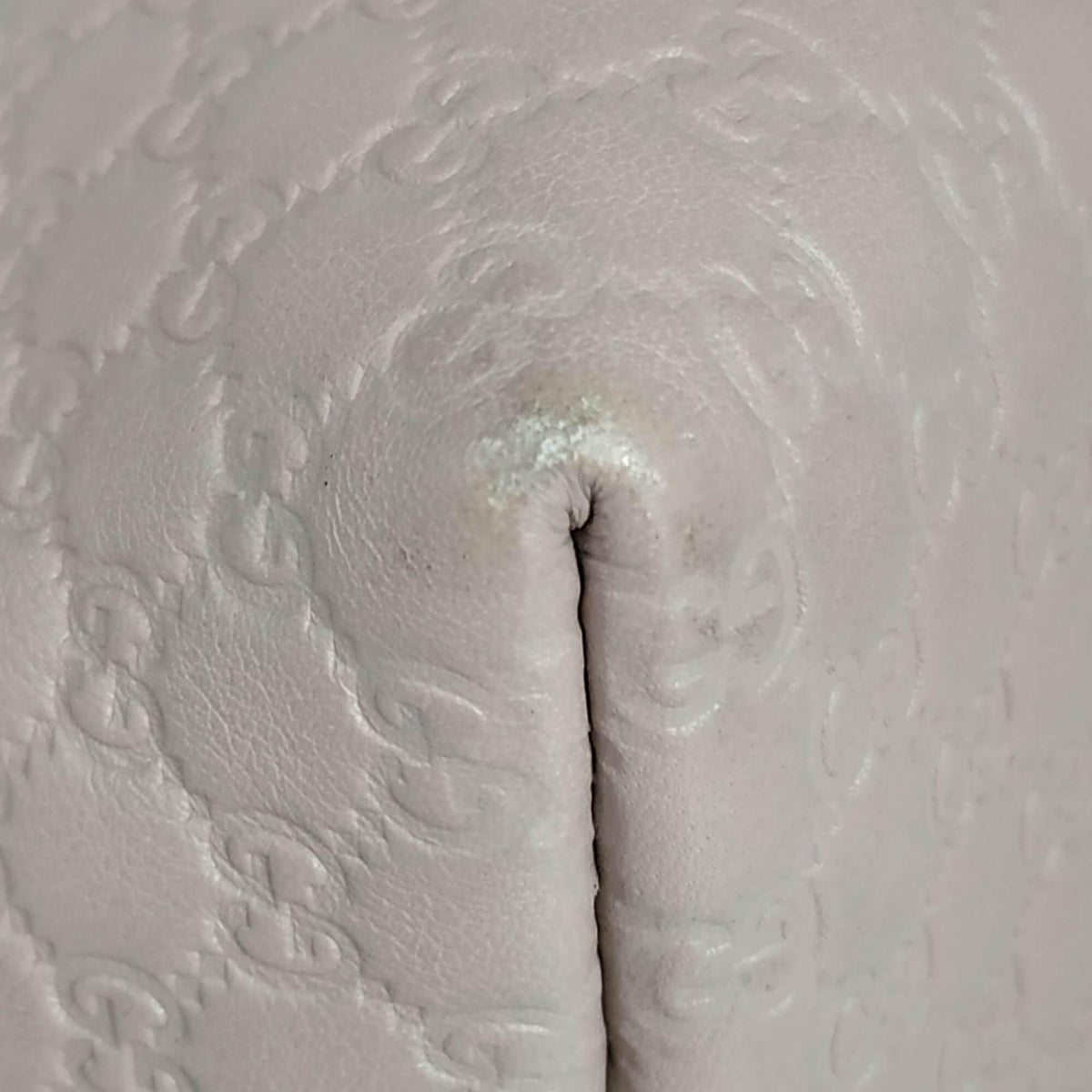 Close-up of Gucci bags hardware and fine stitching